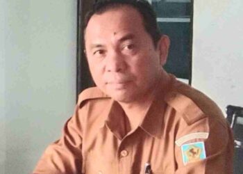 Deddy R.Mokodongan,S.Sos.MM Plt Asisten Perekonomian dan Pembangunan Setda Bolmong Ucapkan Selamat Tahun Baru 2025