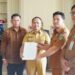 Wabup Bolmong Dony Lumenta Serahkan SK Dewas PDAM