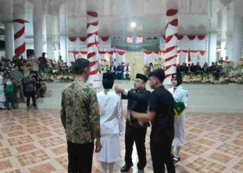 Bupati Bolmong Yusra Alhabsy Mengukuhkan 36 Anggota Paskibraka Untuk HUT RI Ke-80