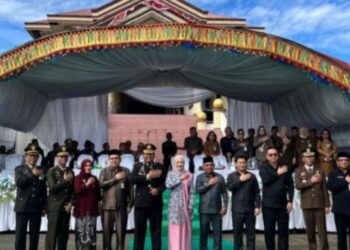 Bupati Bolmong Hadiri Upacara HUT Bhayangkara Ke-79 Bersama Polres Bolmong Di Halaman Kantor Bupati