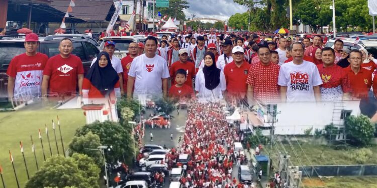 Sambut HUT RI Ke -80, Pemkab Bolsel Gelar Jalan Sehat dan Bagikan Ribuan Bendera Merah Putih
