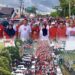 Sambut HUT RI Ke -80, Pemkab Bolsel Gelar Jalan Sehat dan Bagikan Ribuan Bendera Merah Putih