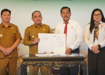 Pemkab Bolmong Bersama Kejari Kotamobagu Teken MoU  Penanganan Perdata Dan TUN