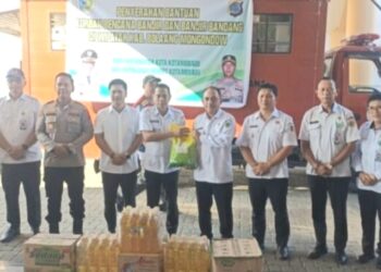 Bantuan Pemkot Dan Polres Kotamobagu Bagi Warga Bolmong Terdampak Banjir Di Terima Bupati Dan Wabup Yusra-Dony