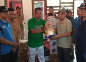 Bupati Yusra Alhabsy Salurkan Bantuan Beras 18.4 Ton di wilayah Terdampak Banjir