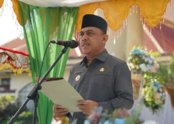 Bupati Pimpin Upacara HUT HGN Dan Korpri Sekaligus Serahkan SK PPPK Paruh Waktu