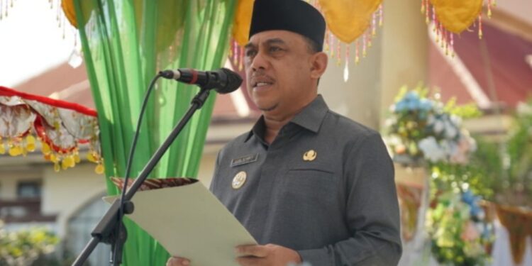 Bupati Pimpin Upacara HUT HGN Dan Korpri Sekaligus Serahkan SK PPPK Paruh Waktu